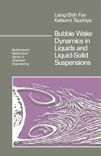 Cover Bubble Wake Dynamics in Liquids and Liquid-Solid Suspensions